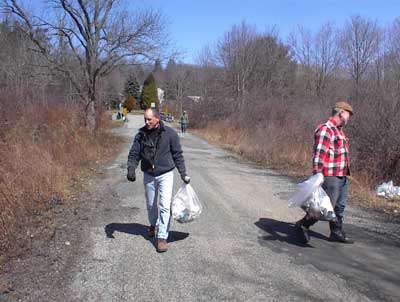 Ross Kushner, Executive Director of the Pequannock River Coalition, helps cleanup Davenport Road in Jefferson, New  Jersey
